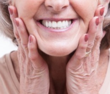 old lady smiling with dentures